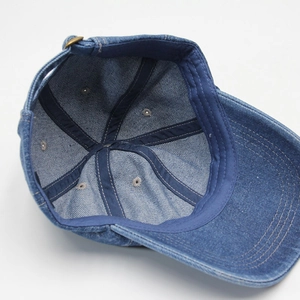 Classic blue denim baseball cap featuring high-quality internal stitching and metal buckle