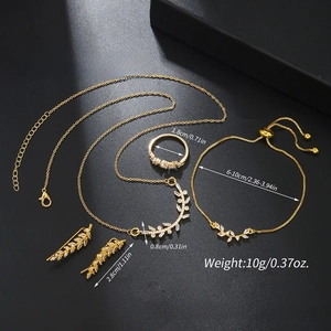 Detail view of gold leaf jewelry set with zircons showing dimensions and refined texture