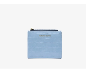 Detail of blue crocodile pattern short wallet with gold zipper and Forever Wany logo