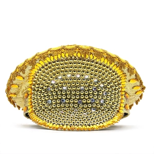 Luxurious gold oval bridal clutch bag with metallic beads, crystals and lace embroidery
