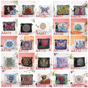 DIY diamond painting crossbody bags with various artistic patterns and gold chains