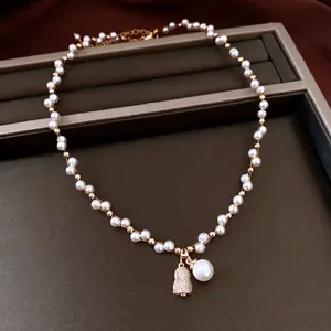 French pearl beaded necklace with luxury zircon gourd pendant and gold accents on a tray