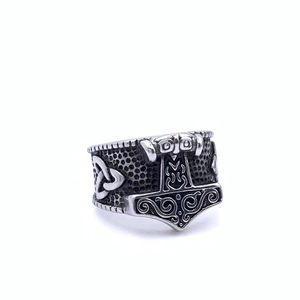 Detailed relief of Viking Mjolnir and Celtic knots on vintage silver stainless steel ring