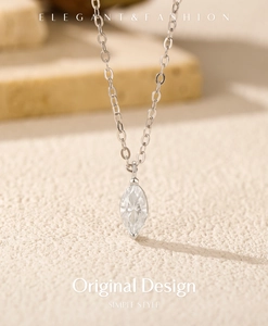 Close-up of marquise-cut Moissanite pendant on a delicate S925 sterling silver chain