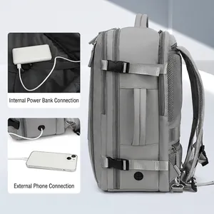 Modern grey laptop backpack for travel with USB charging port and multi-layer storage
