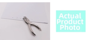 Action shot of silver metal single hole puncher making a precise hole in paper sheet
