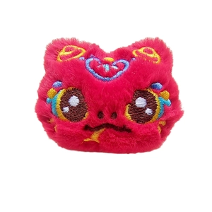 Traditional red plush snake head accessory with colorful embroidery for Chinese New Year