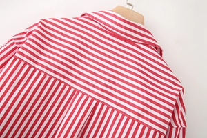 Detail shot of the back yoke and collar of a red and white striped poplin shirt