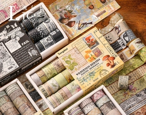 Detail of vintage washi tape set featuring botanical flora and mushroom scrapbooking patterns