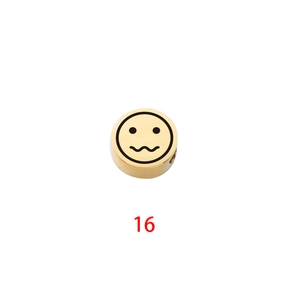 Macro shot of gold-plated stainless steel charm with engraved wavy smile emoji bead
