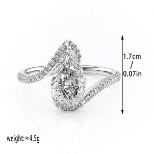 Pear cut zircon teardrop ring with twisted band and pave set crystals, silver finish