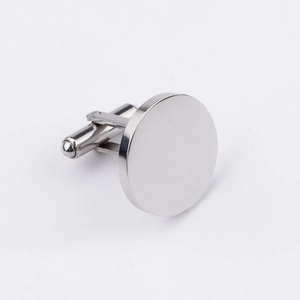 Detailed view of polished silver round cufflinks with T-swing clasp for men