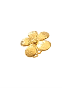 Detailed macro view of 18k gold butterfly flower ring with vintage hammered metal texture
