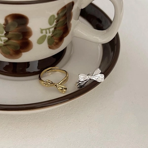 Minimalist S925 sterling silver bow knot rings in gold and silver finish for women