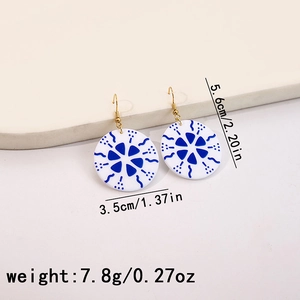 Detail view of round blue patterned earrings with size 5.6cm by 3.5cm and weight 7.8g
