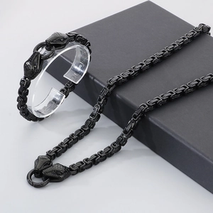 Detail of 6mm black stainless steel king chain set with snake head clasps and display box