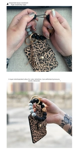 Detail of leopard print leather card holder with colorful silicone beaded wristlet keychain