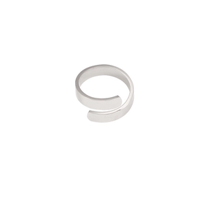 Detail view of a minimalist silver spiral open ring with polished stainless steel finish