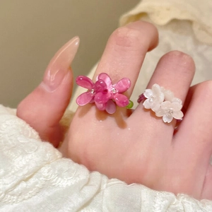 Minimalist handmade beaded flower rings for women in pink and white resin beads