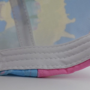 Macro shot of white inner sweatband with durable double-stitched seams on baseball cap