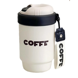 Minimalist cream-white stainless steel coffee tumbler with COFFEE strap and dual-drink lid