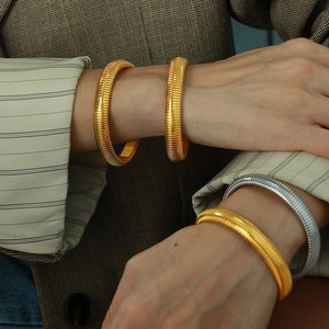 Vintage 10mm Tubogas stretch bracelets in gold and silver finish for women