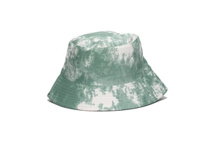 Detailed view of tie-dye bucket hat showing green and white twill canvas texture