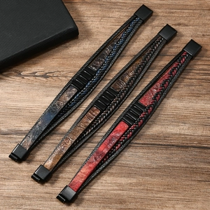 Men's multi-layer braided leather bracelets in gradient snakeskin patterns on wood