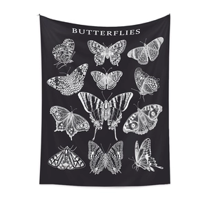 Macro detail of retro butterfly illustration on black bohemian wall tapestry hanging