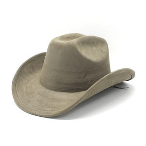 Detail of light brown suede western cowboy hat featuring a wide brim and felt texture