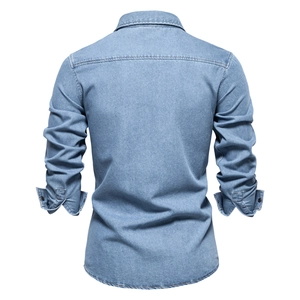 Back view of classic light blue washed cotton denim shirt showing premium stitching detail