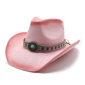 Pink woven straw cowboy hat with ethnic print band and turquoise stone accent for beach