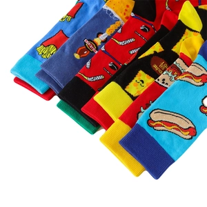 Detailed view of colorful cotton crew socks featuring fries, space, and food patterns