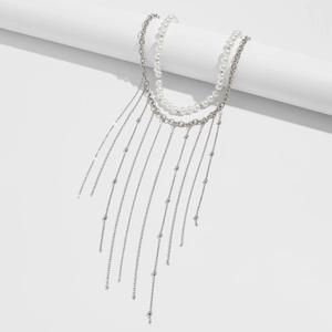 Double-layered faux pearl tassel necklace with silver chain for a bohemian look