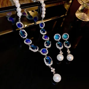 Parure de bijoux perle française et boucles d'oreilles goutte aux cristaux émeraude