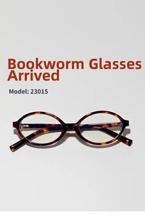 Flat lay of vintage oval tortoiseshell frame glasses with metallic hinges Model 23015