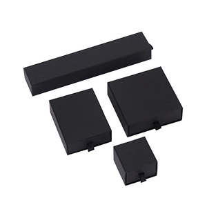Matte black drawer-style jewelry gift boxes with ribbon pulls in various sizes