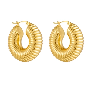 Detailed macro view of gold-plated croissant hoop earrings with spiral ribbed texture