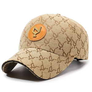 Khaki canvas baseball cap with letter jacquard pattern and orange leather logo patch