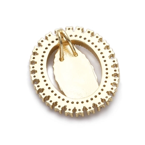 Close-up back view of a gold-plated oval pendant with intricate zircon settings