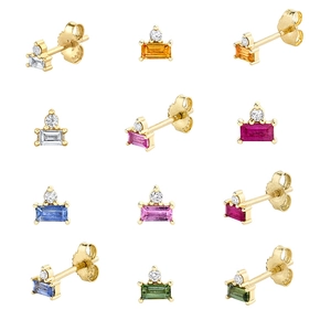 Macro detail of S925 silver earrings with colorful rectangular crystals and gold plating