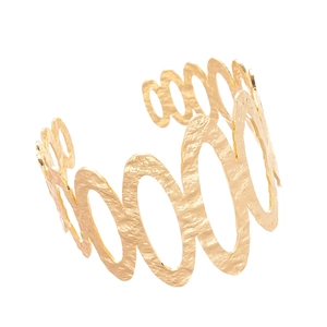 Exaggerated gold hollow oval open cuff bracelet with a unique hammered textured finish