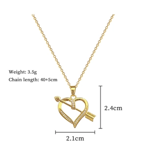 Detail view of gold titanium arrow heart pendant necklace with size dimensions shown