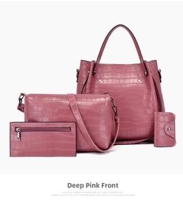 Front view of four-piece deep pink crocodile pattern tote bag and wallet set