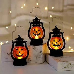 Three pumpkin Halloween lanterns with classic smiling face and black handles on a marble base