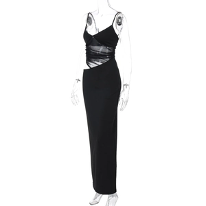 Detailed view of black slim dress with mesh panels, side slit and cutout waist details