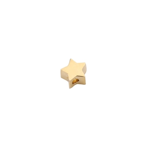 Macro shot of 5mm golden stainless steel star bead with center hole for jewelry making
