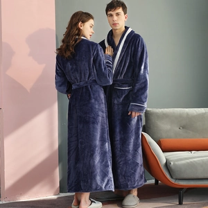 Thick navy blue flannel couple bathrobes with white piping trim and waist tie