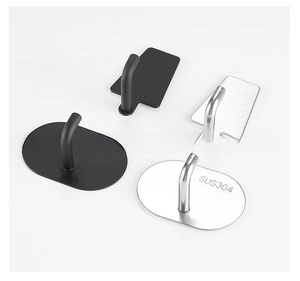 Detail view of 304 stainless steel adhesive hooks in matte black and brushed silver finishes
