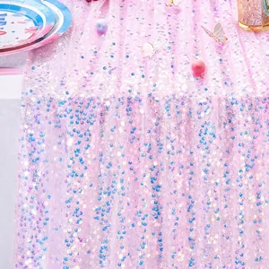 Pink iridescent sequin table runner for mermaid themed parties and festive table decor